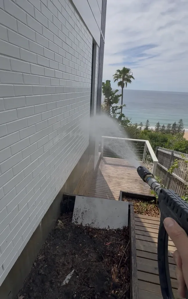 Residential exterior cleaning in progress